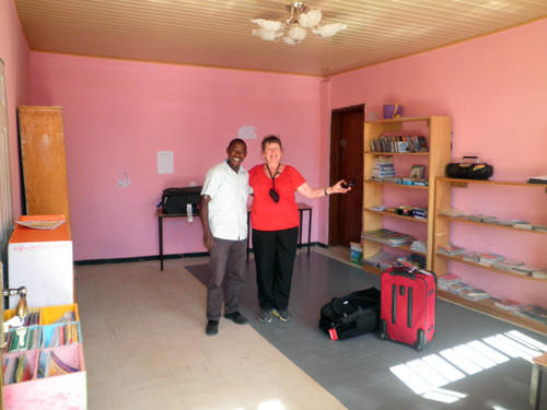 Two teachers standing in the new school library for The School of St Yared as it takes shape