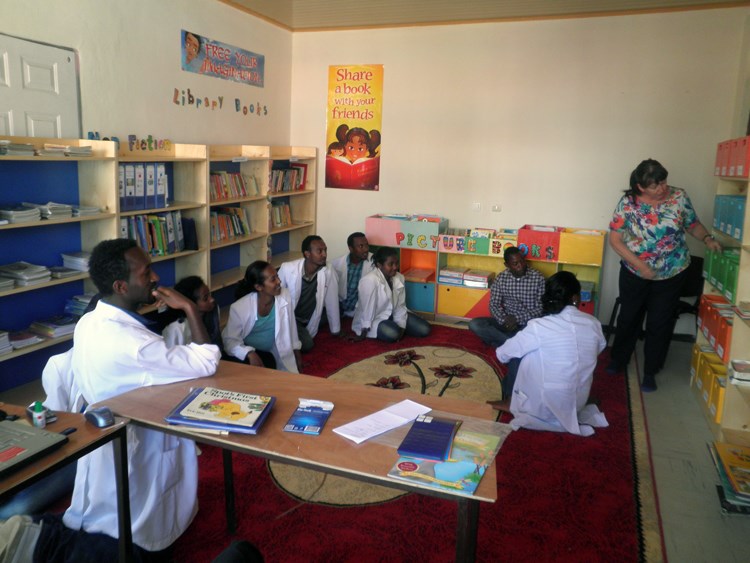 The teachers from The School of St Yared being shown their new school library