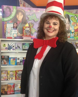 A librarian dressed up as the Cat in the Hat