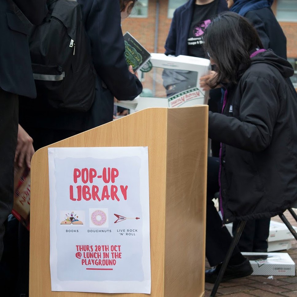 Pop-up library in the playground to encourage more reading.