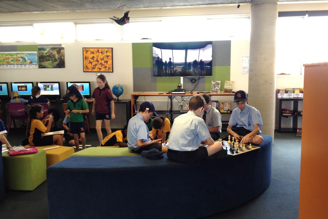 Students socialising in the lounge area of the Canterbury School Library
