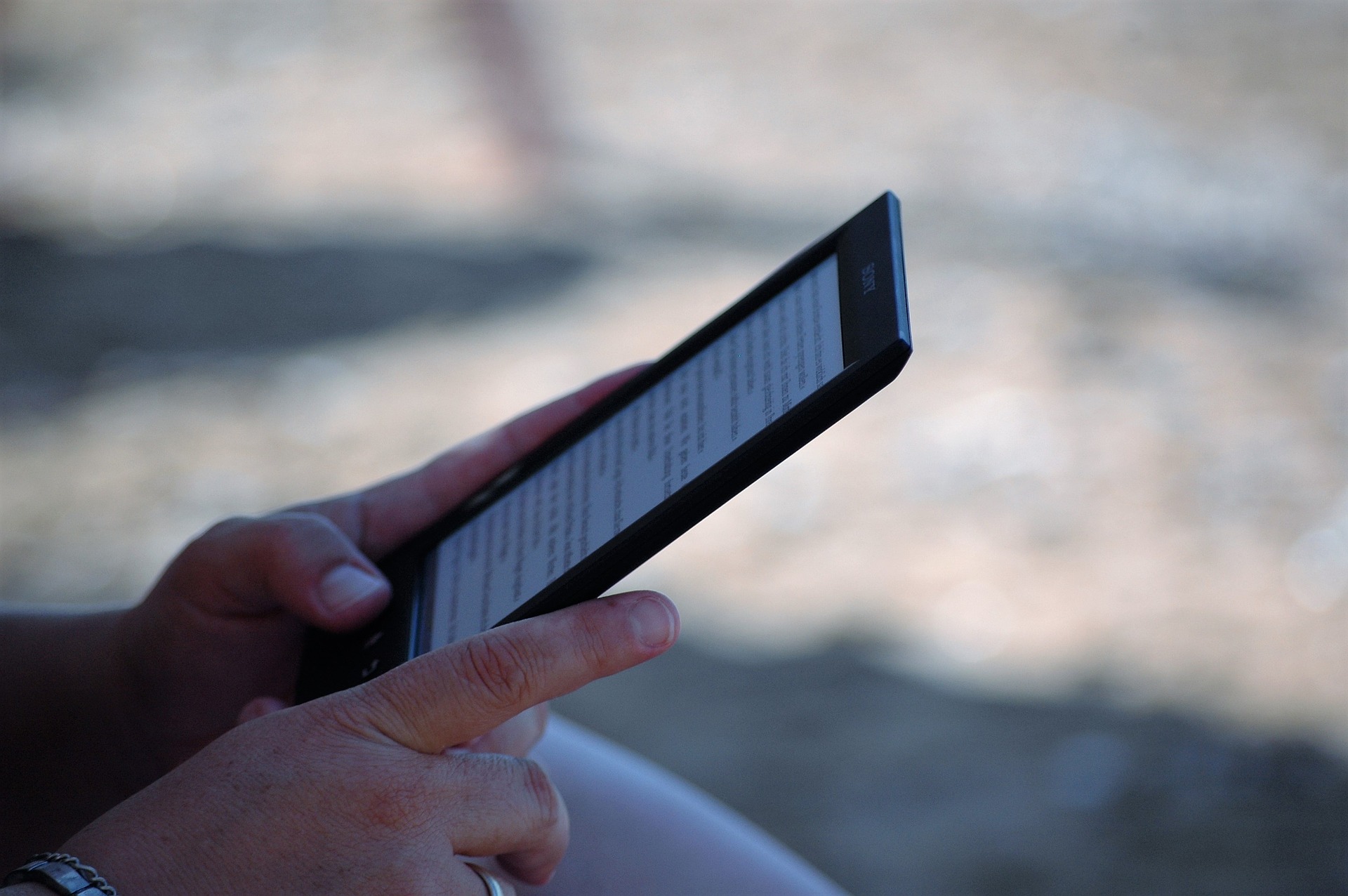 A person using an e-book