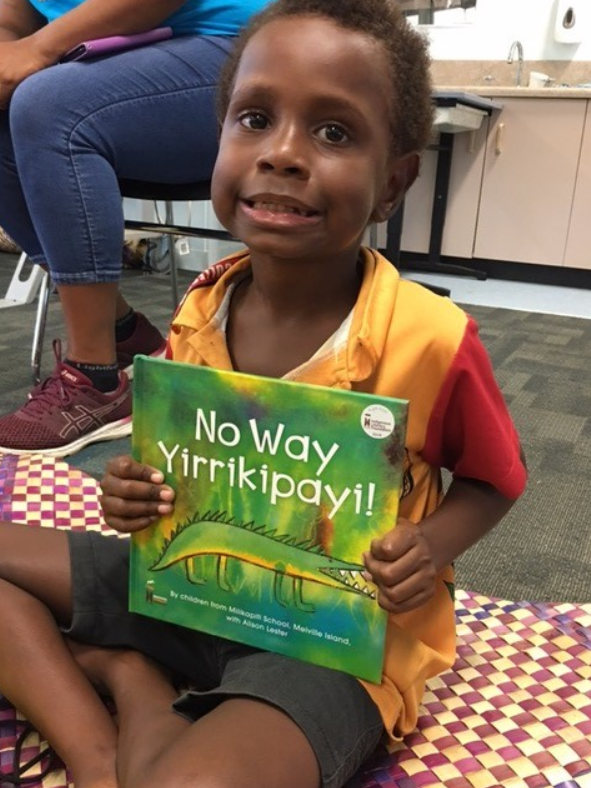 Child holding book