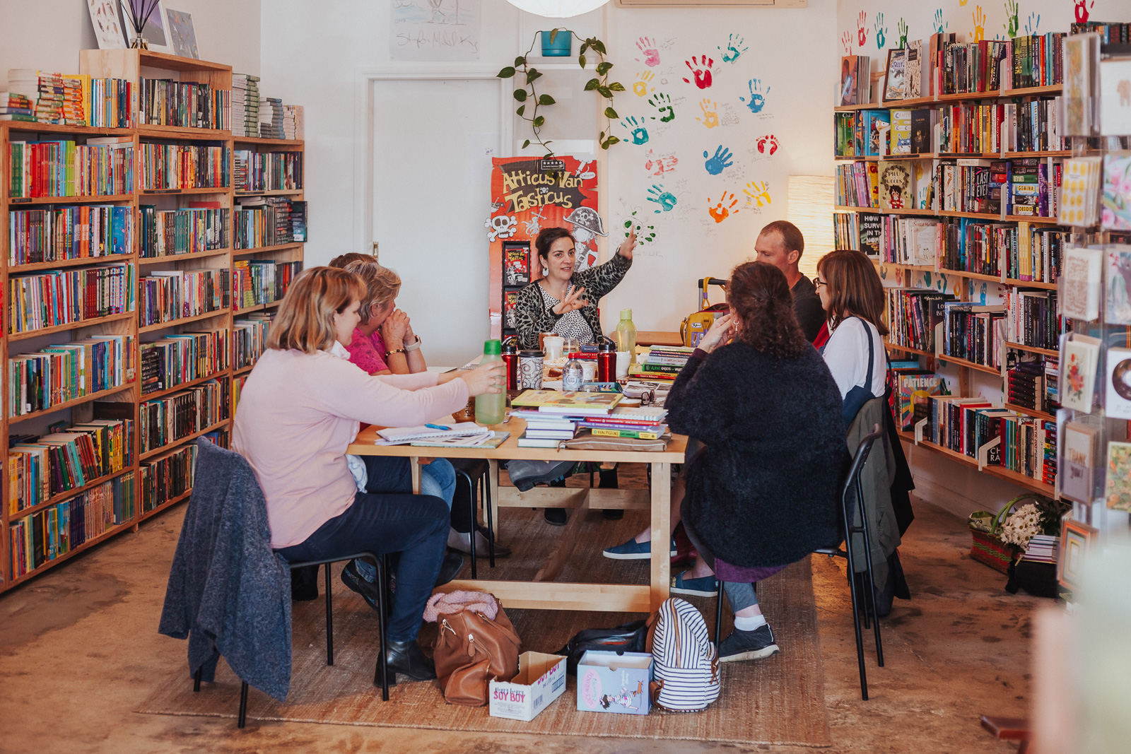 Author and editor Davina Bell talking with visiting librarians at Squishy Minnie bookstore