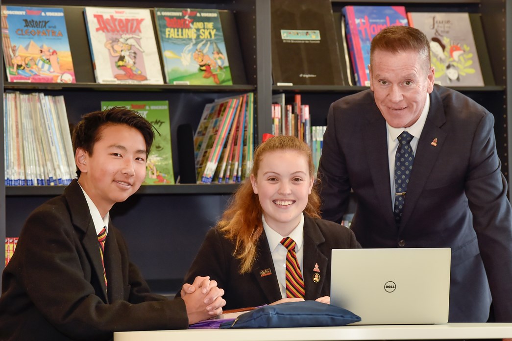 Yarra Valley Grammar Principal, Dr Mark Merry working with students in the John Pascoe Resource Centre.