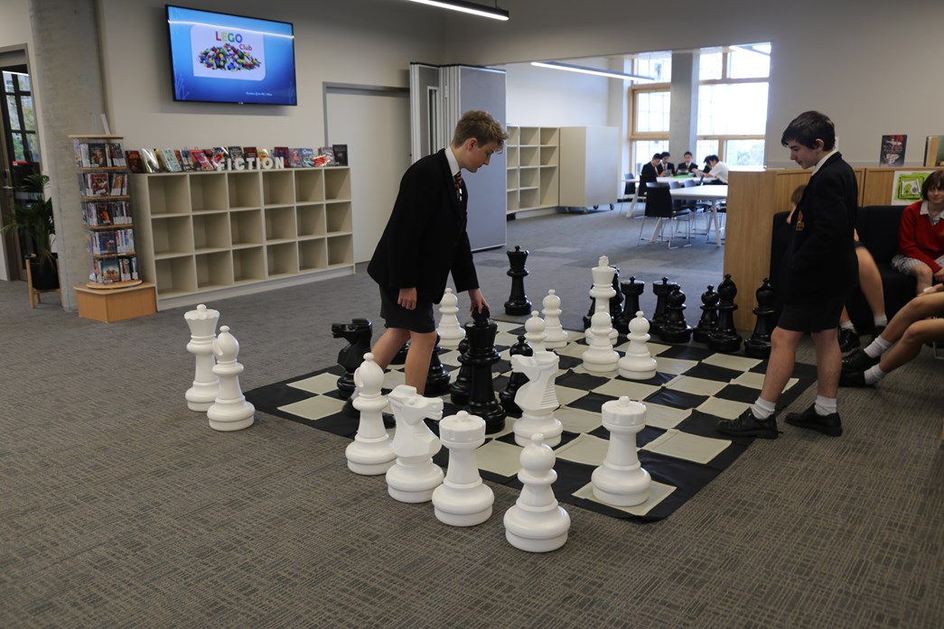 Yarra Valley Grammar students enjoying a game of giant chess in the John Pascoe Resource Centre.