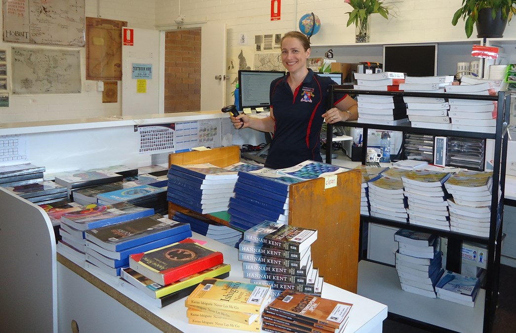 Lorraine Petersen processing textbooks at Toowoomba State High School.