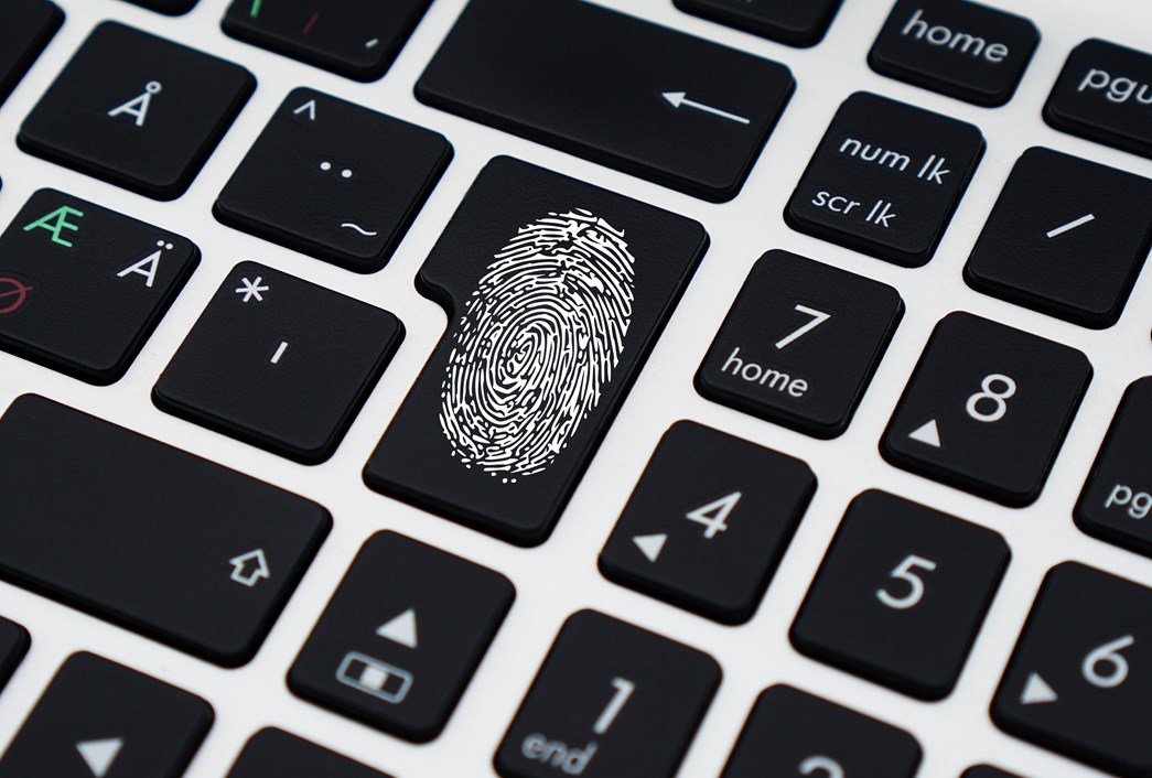 Computer keyboard with fingerprint, representing secure access