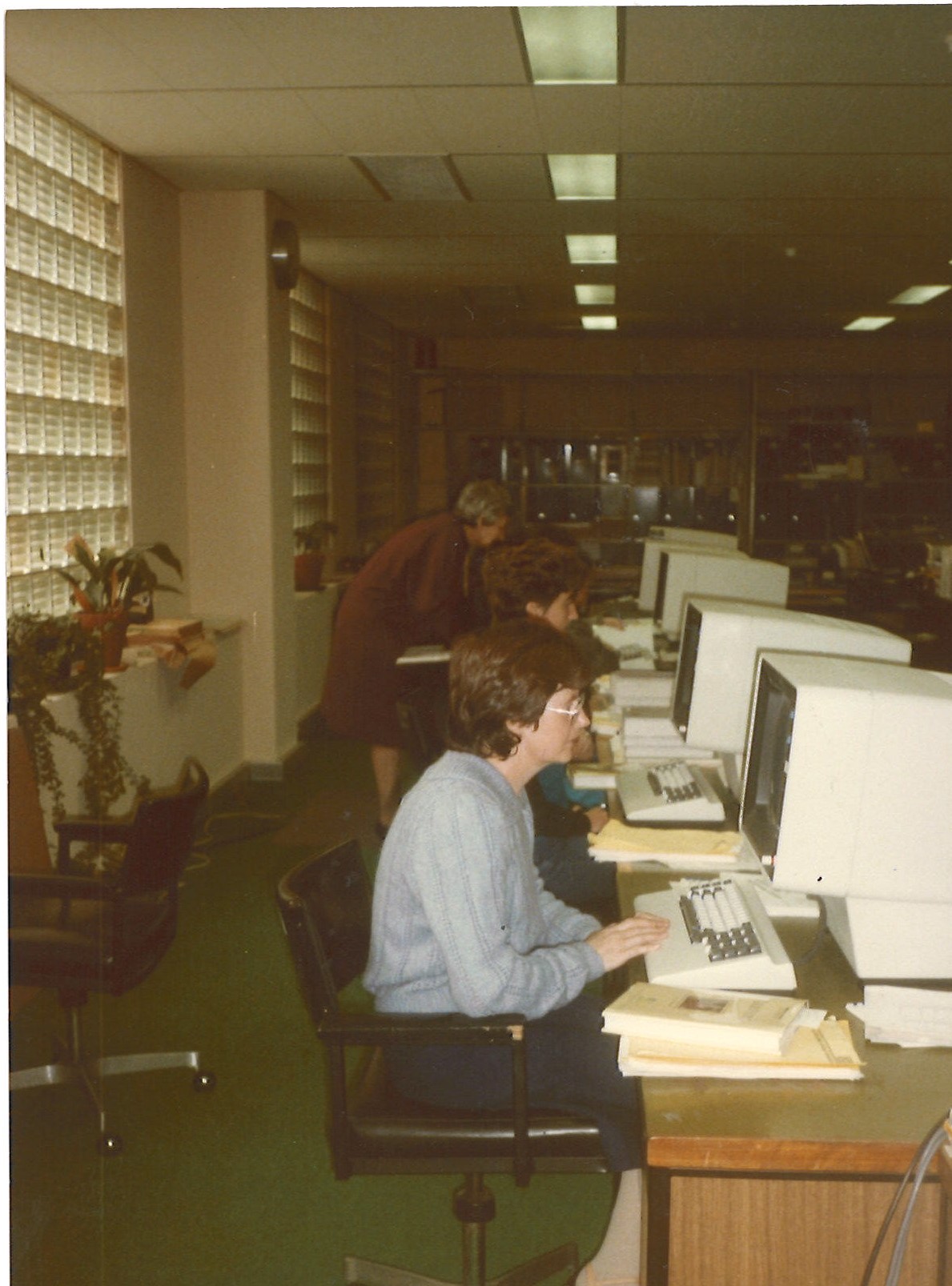 Mavis Heffernan cataloguing for SCIS in the 1980s.