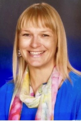 A photo of Vicki Bennet smiling to camera